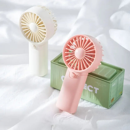 Compact Handheld Cooling Fan with Battery Power for Travel