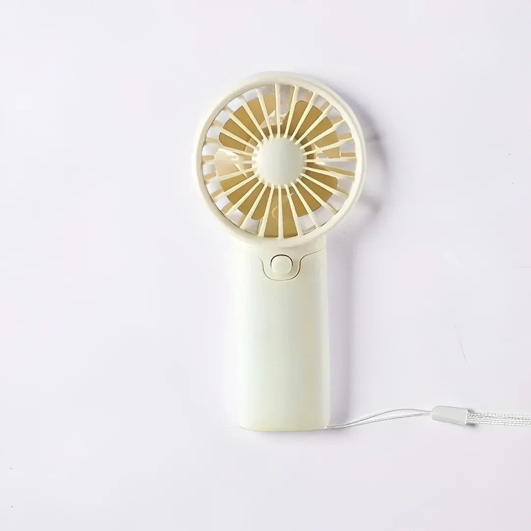 Compact Handheld Cooling Fan with Battery Power for Travel