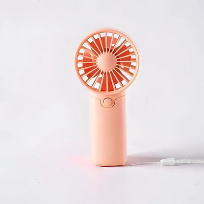 Compact Handheld Cooling Fan with Battery Power for Travel