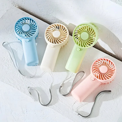 Compact Handheld Cooling Fan with Battery Power for Travel