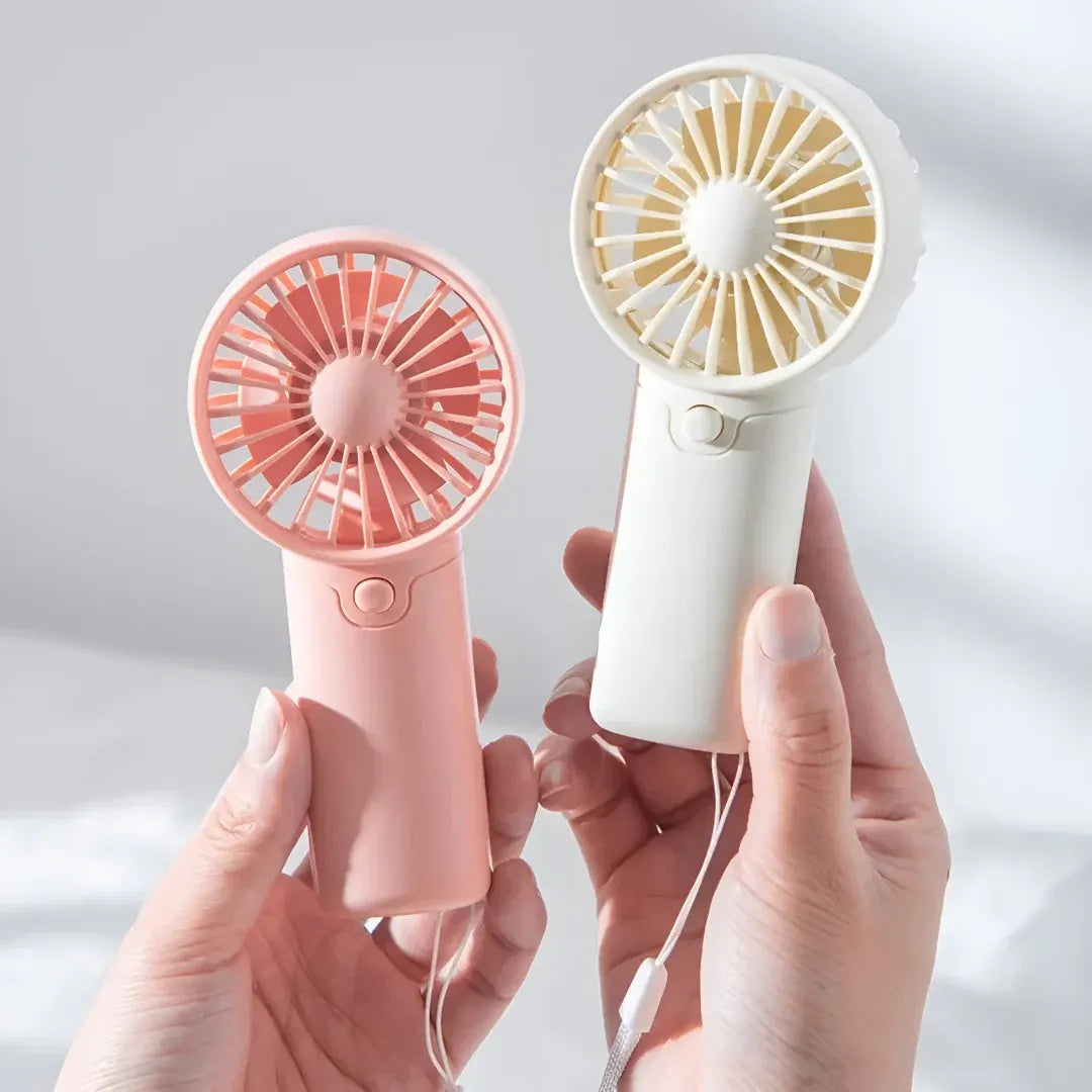 Compact Handheld Cooling Fan with Battery Power for Travel