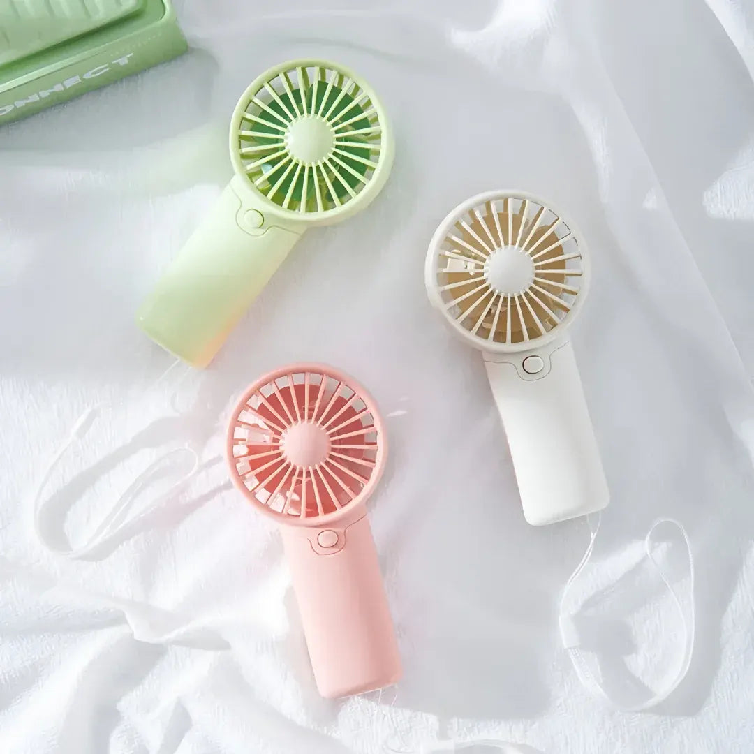 Compact Handheld Cooling Fan with Battery Power for Travel