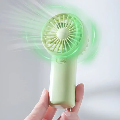 Compact Handheld Cooling Fan with Battery Power for Travel