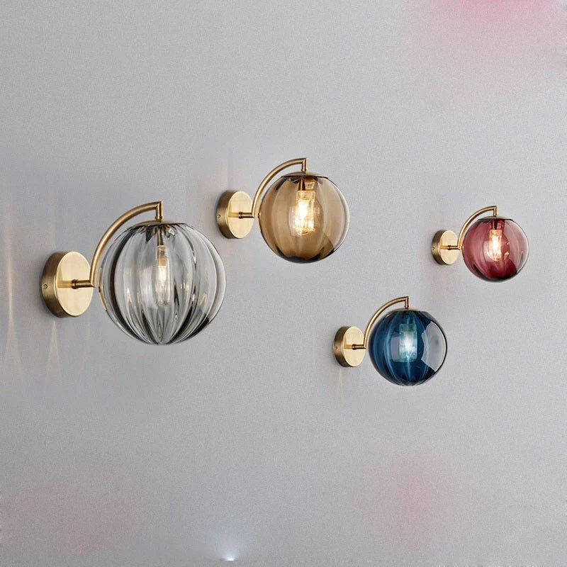 Modern Brass Wall Sconce with Tinted Glass Ball Shade