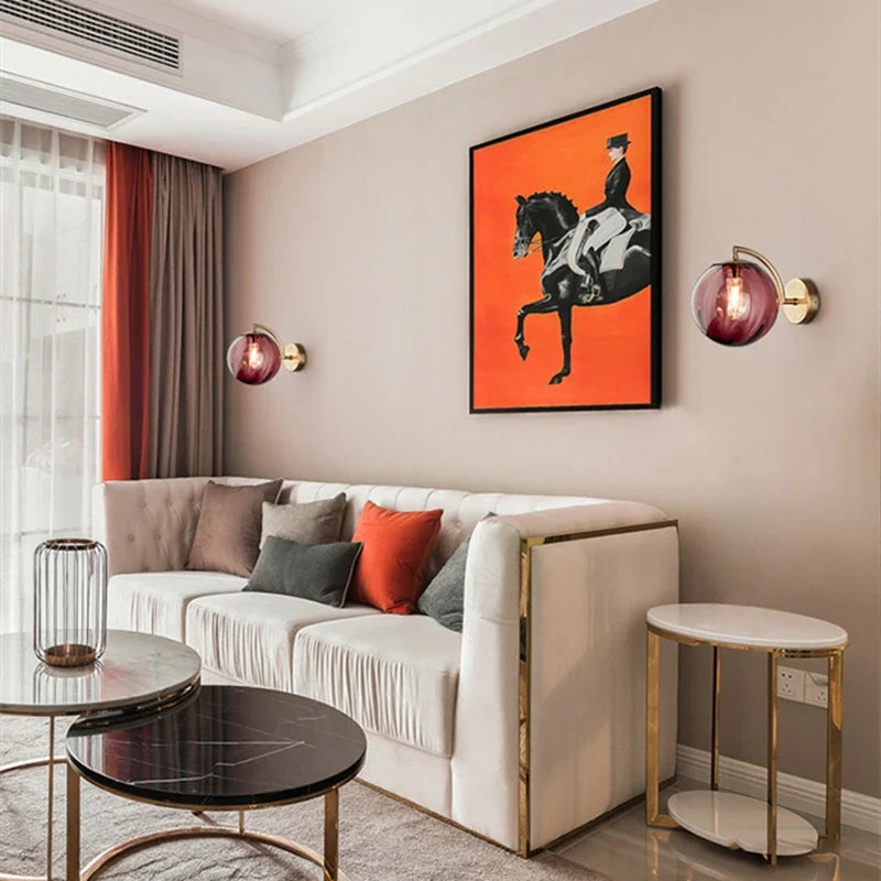 Modern Brass Wall Sconce with Tinted Glass Ball Shade
