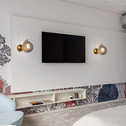 Modern Brass Wall Sconce with Tinted Glass Ball Shade