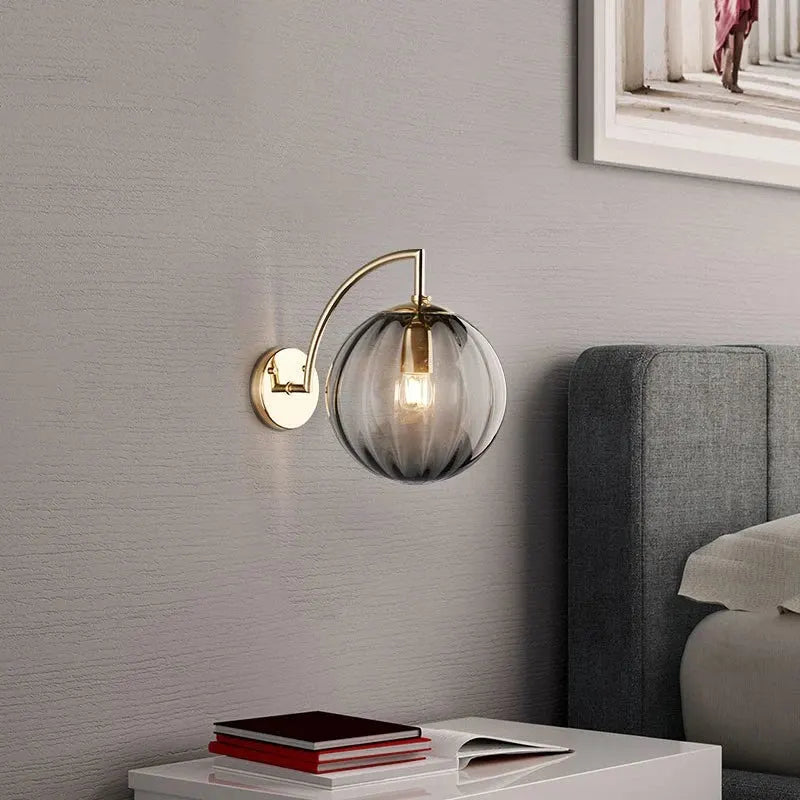 Modern Brass Wall Sconce with Tinted Glass Ball Shade