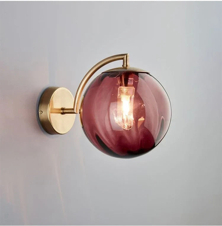 Modern Brass Wall Sconce with Tinted Glass Ball Shade