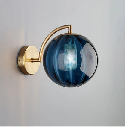 Modern Brass Wall Sconce with Tinted Glass Ball Shade